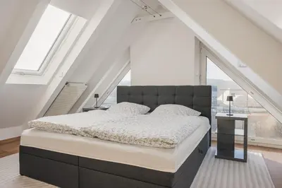 Ein Bett oder Betten in einem Zimmer der Unterkunft Panoramablick auf Baldeneysee