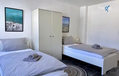 Ein Bett oder Betten in einem Zimmer der Unterkunft BEGE APARTMENTS Corporate Living
