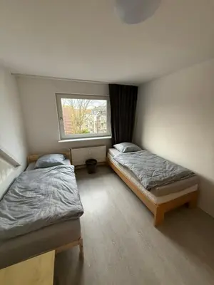 Ein Bett oder Betten in einem Zimmer der Unterkunft Monteurzimmer Schölerpad