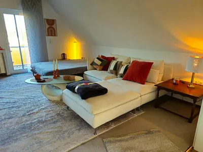 Ein Bett oder Betten in einem Zimmer der Unterkunft Gemütliche Dachgeschoßwohnung mit Balkon in Dortmund