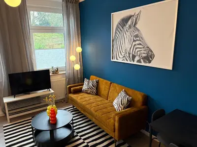 Ein Sitzbereich in der Unterkunft Kleines Zebra