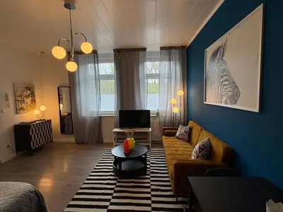Ein Sitzbereich in der Unterkunft Kleines Zebra