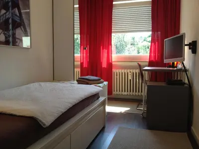 Ein Bett oder Betten in einem Zimmer der Unterkunft HertenFlats - Apartment Balkon