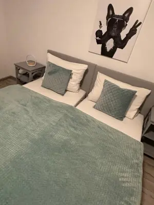 Ein Bett oder Betten in einem Zimmer der Unterkunft Smile Apartment 3