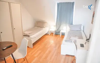 Ein Bett oder Betten in einem Zimmer der Unterkunft BEGE APARTMENTS Company Zone