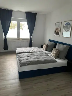 Ein Bett oder Betten in einem Zimmer der Unterkunft Smile Apartment 4