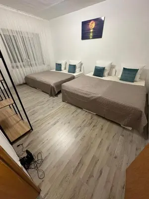 Ein Bett oder Betten in einem Zimmer der Unterkunft Smile Apartment 5