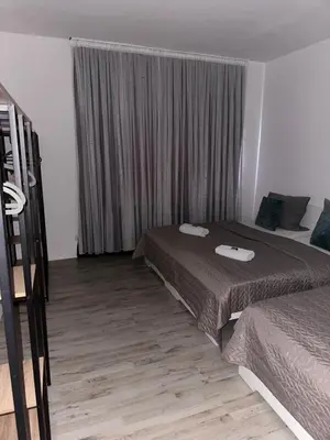 Ein Bett oder Betten in einem Zimmer der Unterkunft Smile Apartment 5