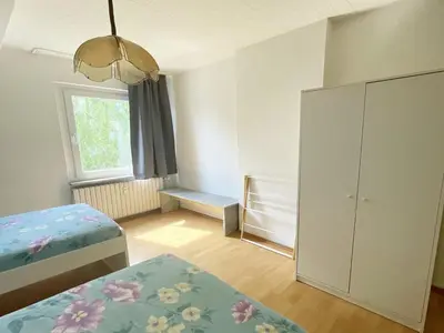 Ein Bett oder Betten in einem Zimmer der Unterkunft Cozy Apartment in Duisburg