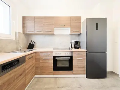 Küche/Küchenzeile in der Unterkunft Tolstov Apartments - Monteurwohnung - 3 Schlafzimmer - Küche - Balkon - Waschmaschine