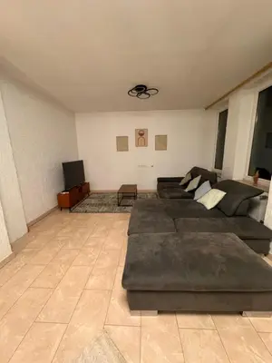 Ein Sitzbereich in der Unterkunft A&V Apartments Arena Schalke