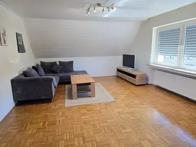 Ein Sitzbereich in der Unterkunft Apartment Ergste am Ruhr 85 sqm , 3 minutes to A45 with Garage