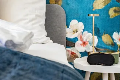 Ein Bett oder Betten in einem Zimmer der Unterkunft City Cocoon