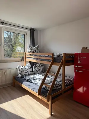 Ein Bett oder Betten in einem Zimmer der Unterkunft Urban Nest