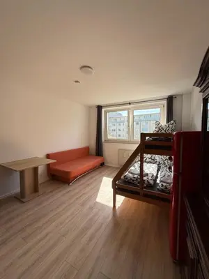 Ein Bett oder Betten in einem Zimmer der Unterkunft Urban Nest