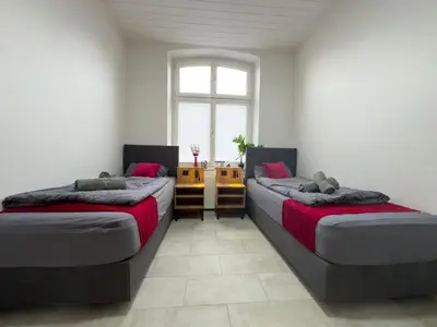 Ein Bett oder Betten in einem Zimmer der Unterkunft Serviceroom24 - Apartment 6 in Recklinghausen Hoch WLAN - Smart-TV - 24-7 Check-in und Küche