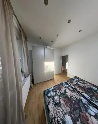 Ein Bett oder Betten in einem Zimmer der Unterkunft FeWo Sportpark Duisburg - Sechs Seen Platte