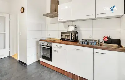 Küche/Küchenzeile in der Unterkunft BEGE APARTMENTS CompanyLife