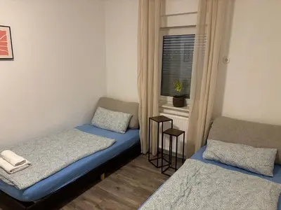Ein Bett oder Betten in einem Zimmer der Unterkunft Große 100qm Wohnung für 6 Personen in der Altstadt