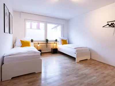Ein Bett oder Betten in einem Zimmer der Unterkunft BudgetRoom Workers Home