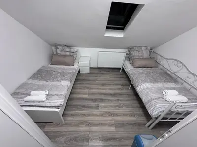Ein Bett oder Betten in einem Zimmer der Unterkunft Apartment Wuppertal 4P Küche