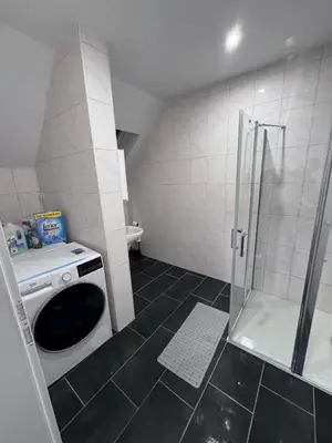 Ein Badezimmer in der Unterkunft Apartment Wuppertal 4P Küche
