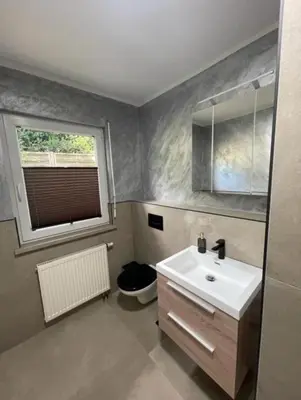 Ein Badezimmer in der Unterkunft Nußberg Apartments Iserlohn