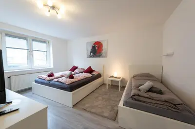 Ein Bett oder Betten in einem Zimmer der Unterkunft HagenStay Mittelstadt 2