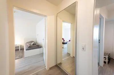 Ein Bett oder Betten in einem Zimmer der Unterkunft HagenStay Mittelstadt 2