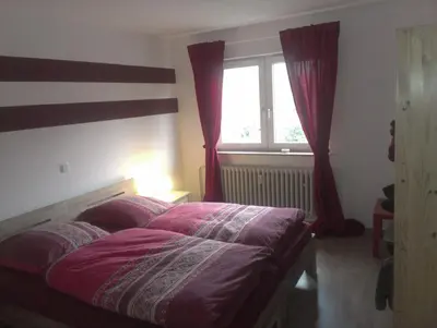 Ein Bett oder Betten in einem Zimmer der Unterkunft Leisnig, Boltes Fewo DU-Wedau