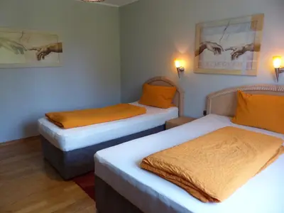 Ein Bett oder Betten in einem Zimmer der Unterkunft Haus der Gastlichkeit