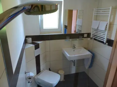 Ein Badezimmer in der Unterkunft Haus der Gastlichkeit