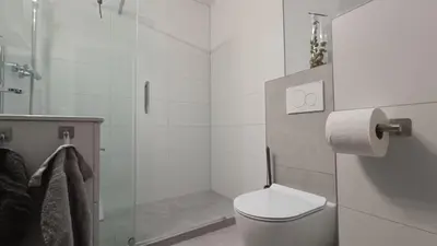 Ein Badezimmer in der Unterkunft FeWo Marjenza