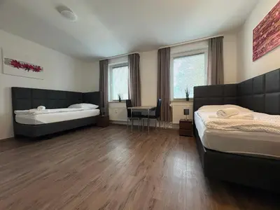 Ein Bett oder Betten in einem Zimmer der Unterkunft Ferienwohnung Evelyn