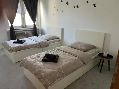 Ein Bett oder Betten in einem Zimmer der Unterkunft Fewo Alpina