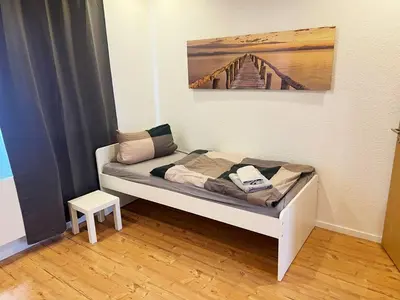 Ein Bett oder Betten in einem Zimmer der Unterkunft Zeitwohnen in Hückeswagen -Neu-