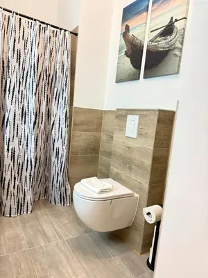 Ein Badezimmer in der Unterkunft Perfect for fans and family