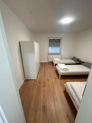 Ein Bett oder Betten in einem Zimmer der Unterkunft Frisch renovierte Wohnung