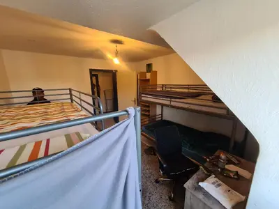 Ein Bett oder Betten in einem Zimmer der Unterkunft Raum in AE max 4 B