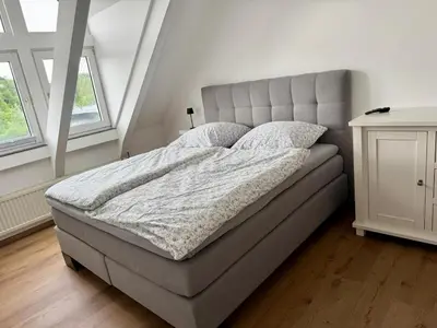 Ein Bett oder Betten in einem Zimmer der Unterkunft Seeblick trifft Kampmannbrücke - Dein Lieblingsplatz