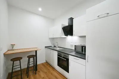 Küche/Küchenzeile in der Unterkunft BetonTraum Apartments