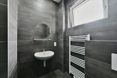 Ein Badezimmer in der Unterkunft BetonTraum Apartments