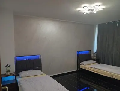 Ein Bett oder Betten in einem Zimmer der Unterkunft Ferienwohnung