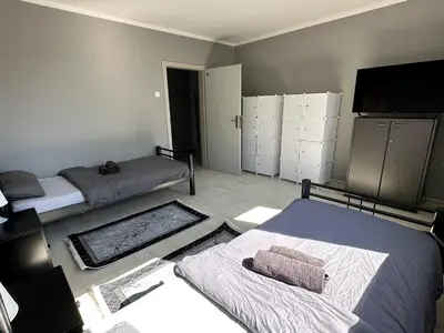 Ein Bett oder Betten in einem Zimmer der Unterkunft Monteurswohnung am Schloss 2