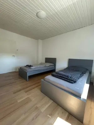 Ein Bett oder Betten in einem Zimmer der Unterkunft SleepInn Essen