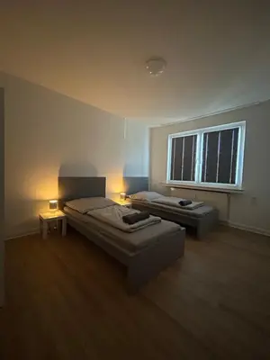 Ein Bett oder Betten in einem Zimmer der Unterkunft SleepInn Essen