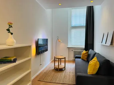 TV/Unterhaltungsangebot in der Unterkunft Modernes und großzügiges City-Apartment 66 qm - zentral und zum Wohlfühlen - Easy Stay Wuppertal