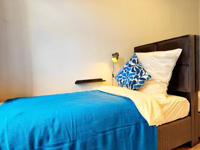 Ein Bett oder Betten in einem Zimmer der Unterkunft Komfort-Apartment Wuppertal mit 3 SZ & gemütliches Wohnzimmer