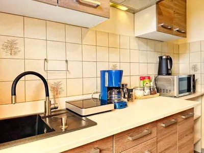 Küche/Küchenzeile in der Unterkunft Komfort-Apartment Wuppertal mit 3 SZ & gemütliches Wohnzimmer