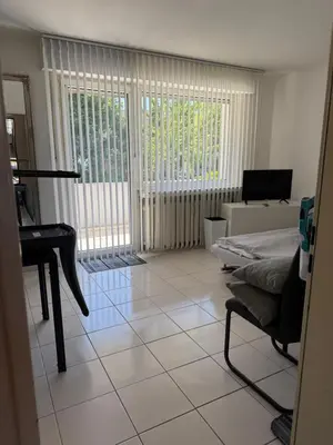 Ein Sitzbereich in der Unterkunft Ferienwohnung-Montagewohnunng DO